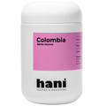 White container with pink label featuring 'Colombia Santa Monica' and 'hani Coffee & Roastery' on a white background